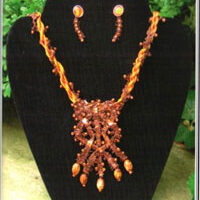 Surface decoration in silk and metallic thread