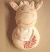 Doudou mucca bianca e rosa con sonaglino interno, dmc - immagine 2
