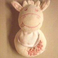 Doudou mucca bianca e rosa con sonaglino interno, dmc