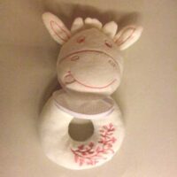 Doudou mucca bianca e rosa con sonaglino interno, dmc