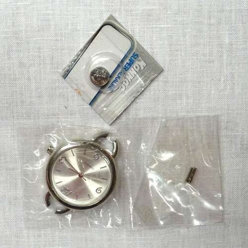 Base in metallo argentato per orologio tondo  cm 2,5