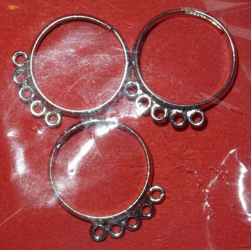 ANELLO REGOLABILE CON 5 OCCHIELLI DA CM 1,6 A 2,3/3 PEZZI COLORE PLATINO