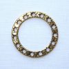 Anello forato tondo stelline  cm 2,8 x 0,38 x 0, 15 colore oro