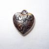 Cuore in metallo ciondolo "acanto"  cm 2,4 x 2,6 x 0,8 argentone