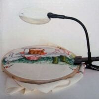 Lente da telaio con pinza dmc
