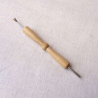 Toglispilli doppio in legno di ulivo gradese