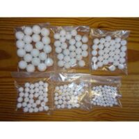 Palline bianche d'ovatta pressata con foro varie misure