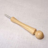 Toglispilli a tubino in legno di ulivo gradese