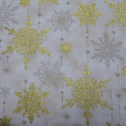 Stelle oro fondo panna, stoff vendita a multipli di cm 50