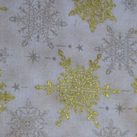 Stelle oro fondo panna, stoff vendita a multipli di cm 50