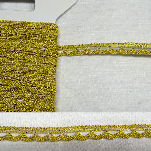 Fp323 Bordino ragnetti oro mezzo fino - altezza mm 6 - € 4,00 al metro - vendita a multipli di 50 cm