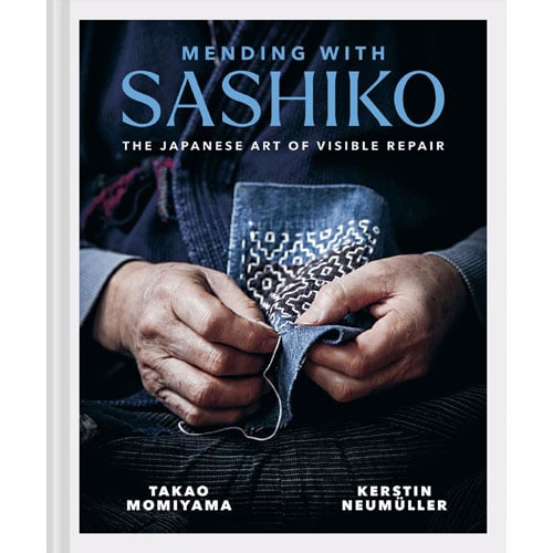 Rp147 Copertina del libro Riparare con il Sashiko di Takao “Momi” Momiyama, con dettagli di rammendo visibile su tessuti indaco e motivi geometrici giapponesi.